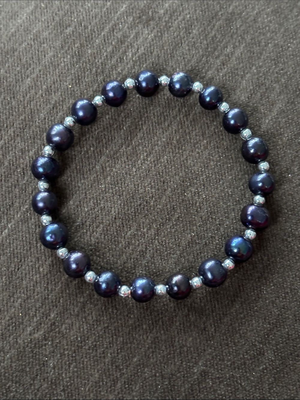 Lustrous Dark Black Pearl Stretch Bracelet with Silver Accent Beads
